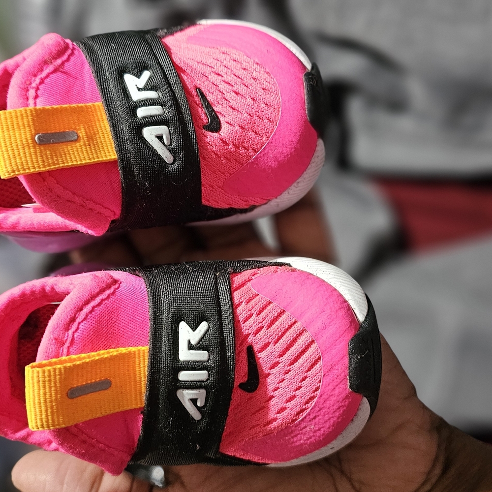 Nike Pink and Black Sneakers with Breathable Design